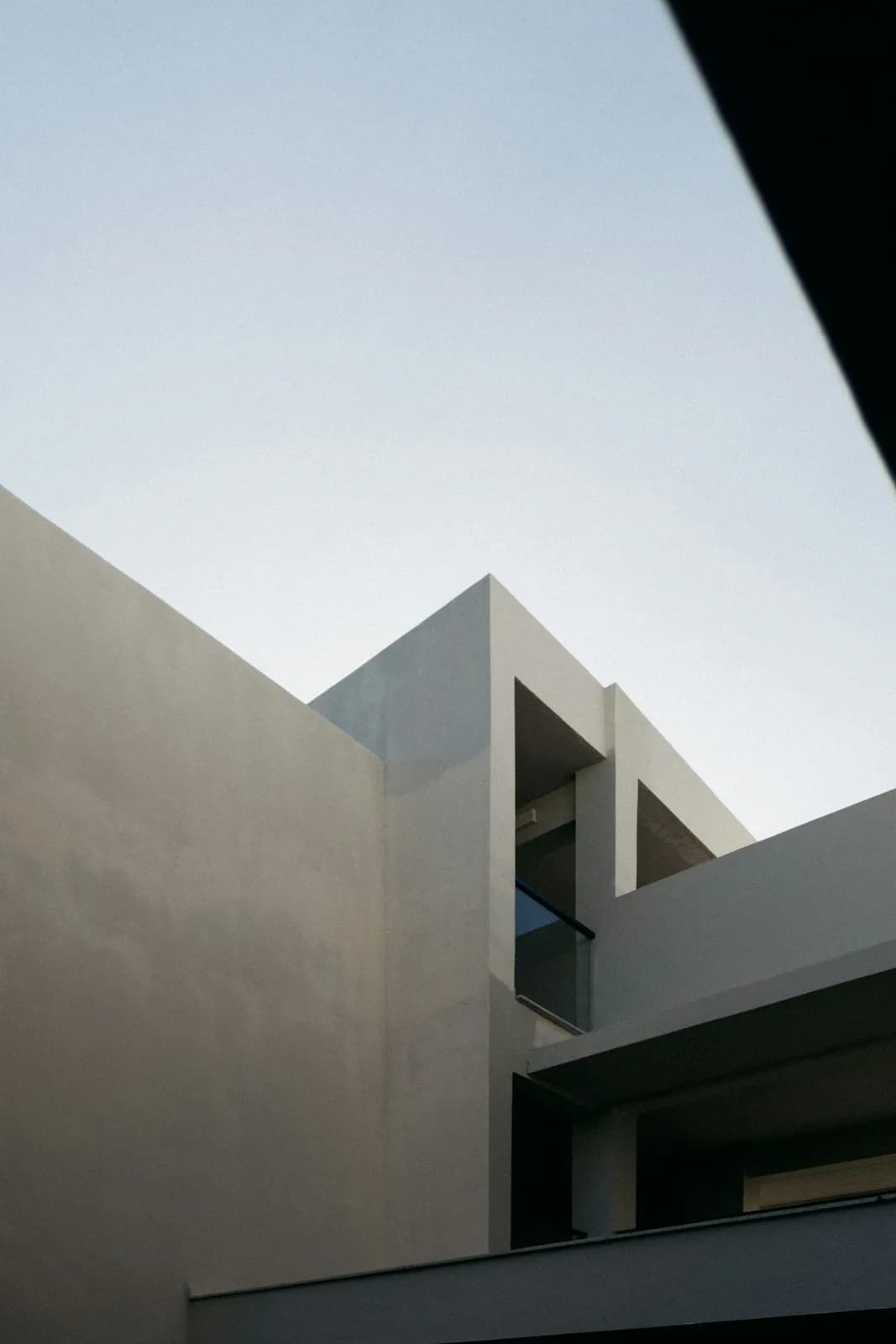 White concrete building under blue sky during daytime