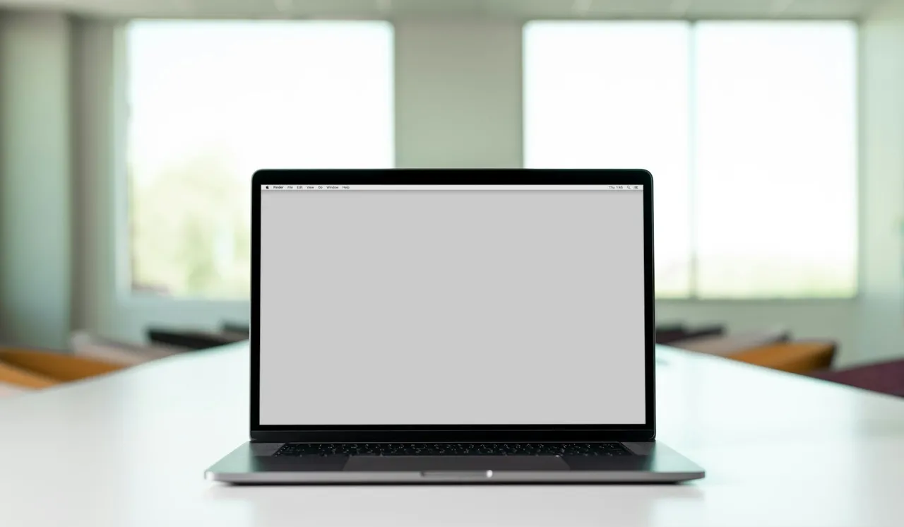 Macbook pro on white table