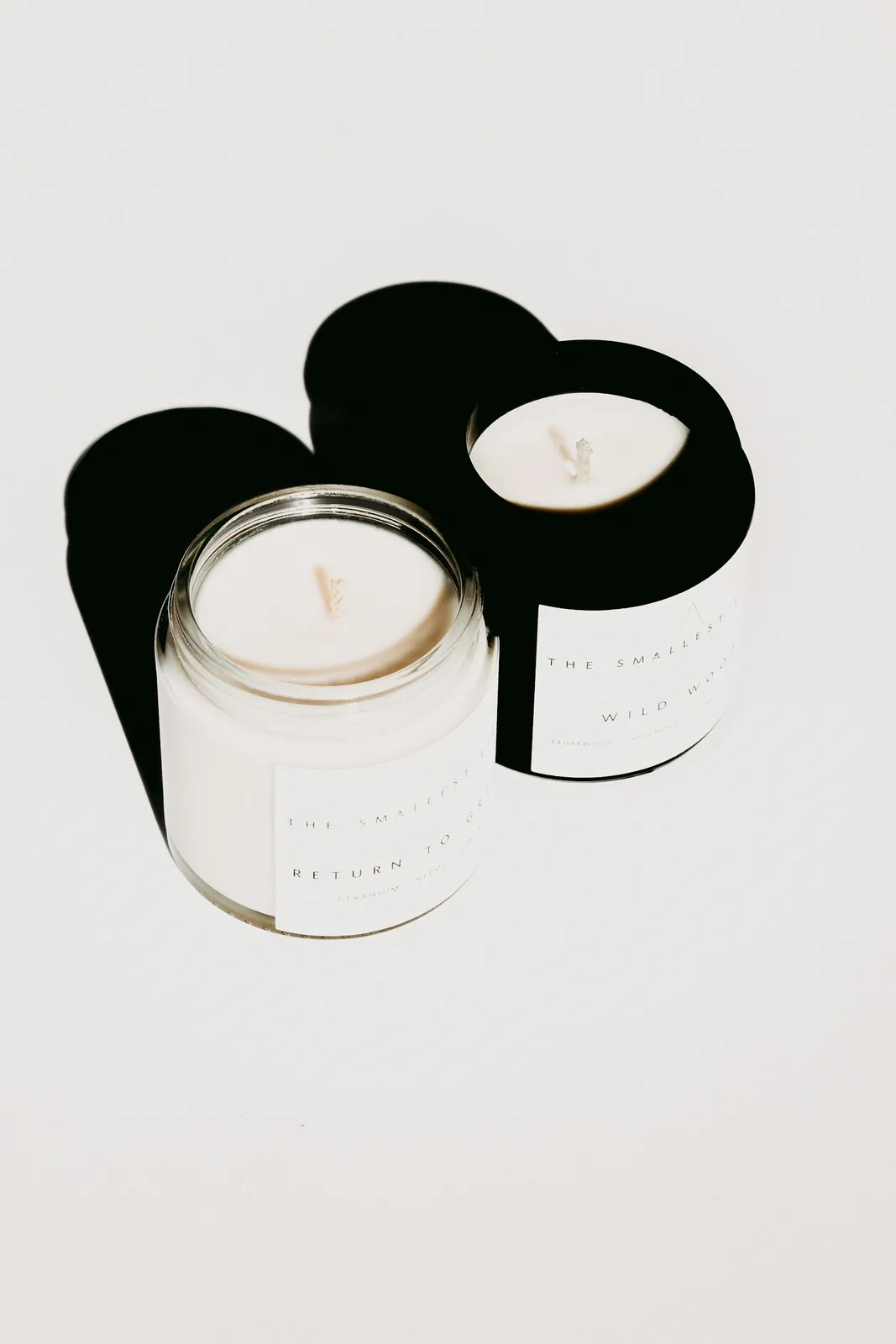 White and black round candle holder