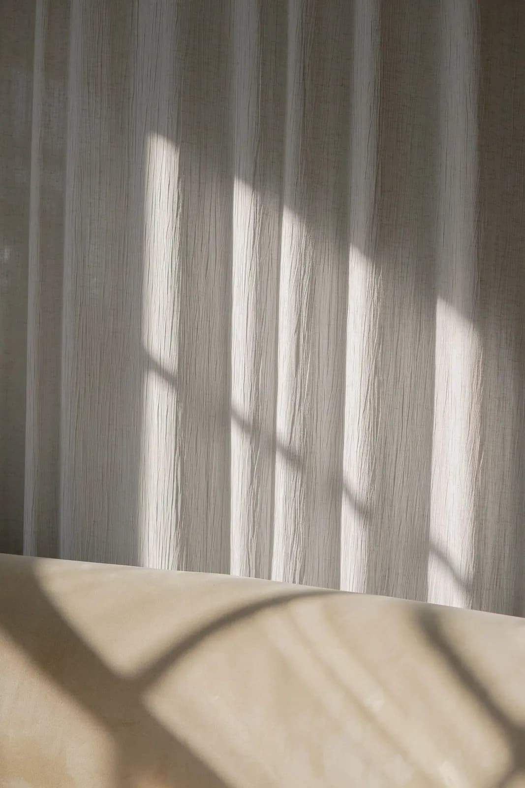 White and brown window curtain